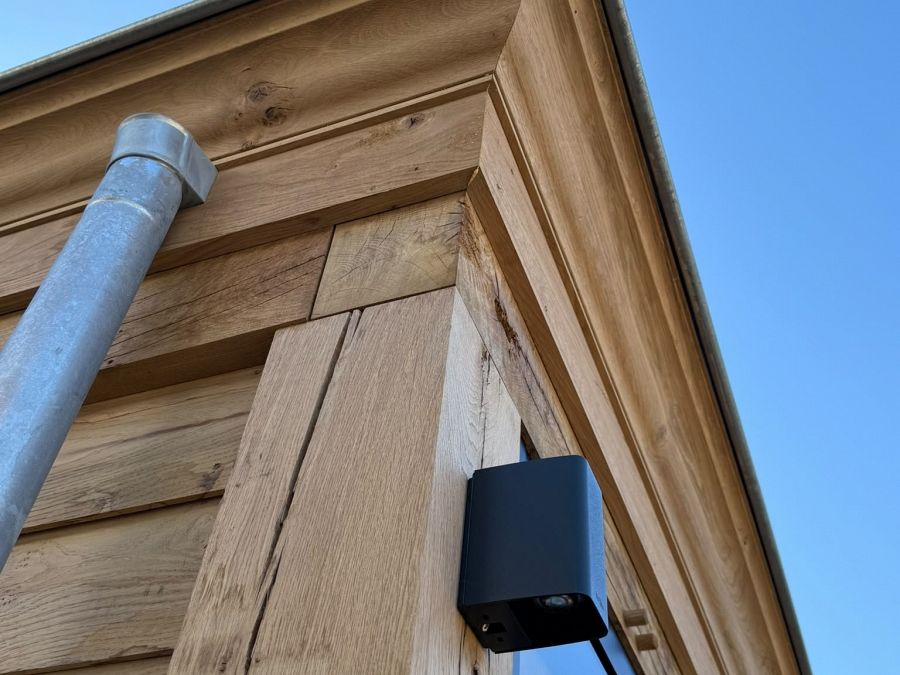 Tuinaanleg met overkapping en tuinberging te Weelde